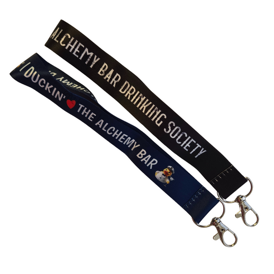 Lanyard with 'Alchemy Bar Drinking Society' text on a white background