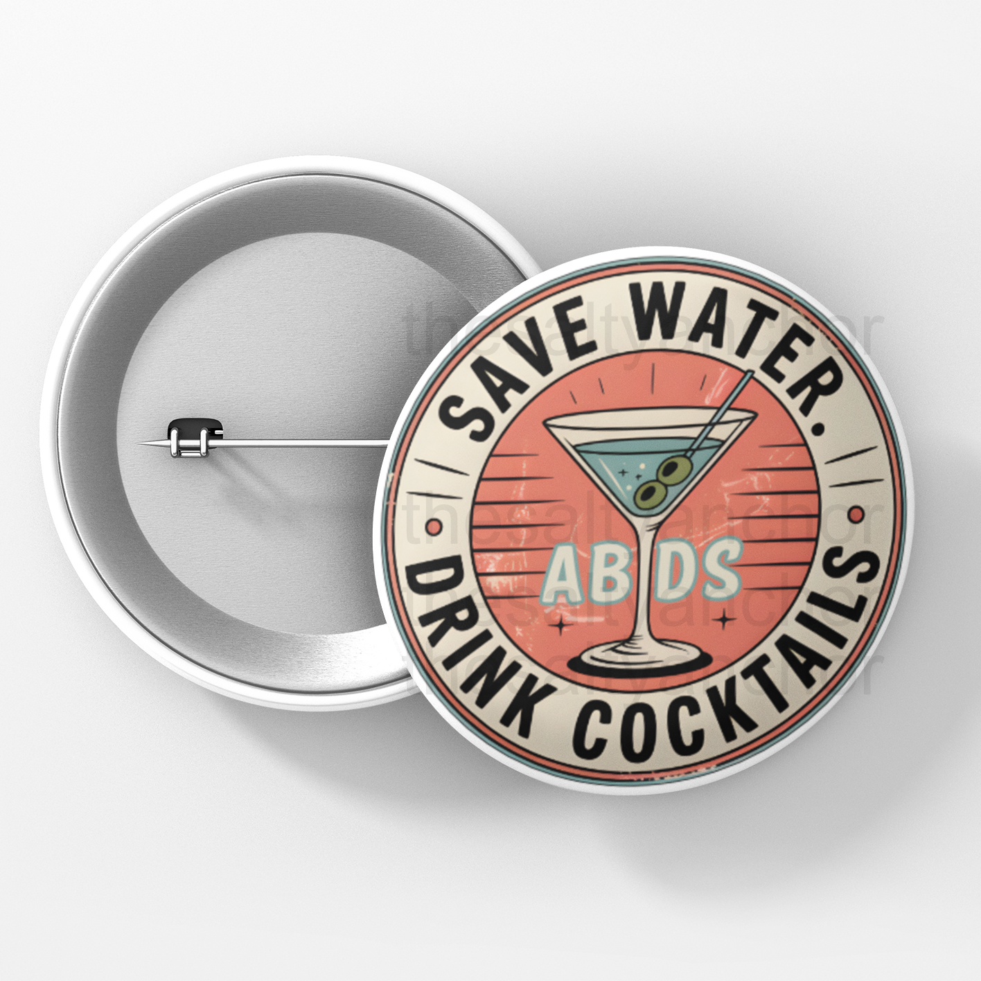 Button badge with a cocktail graphic and text 'Save Water, Drink Cocktails' on a white background