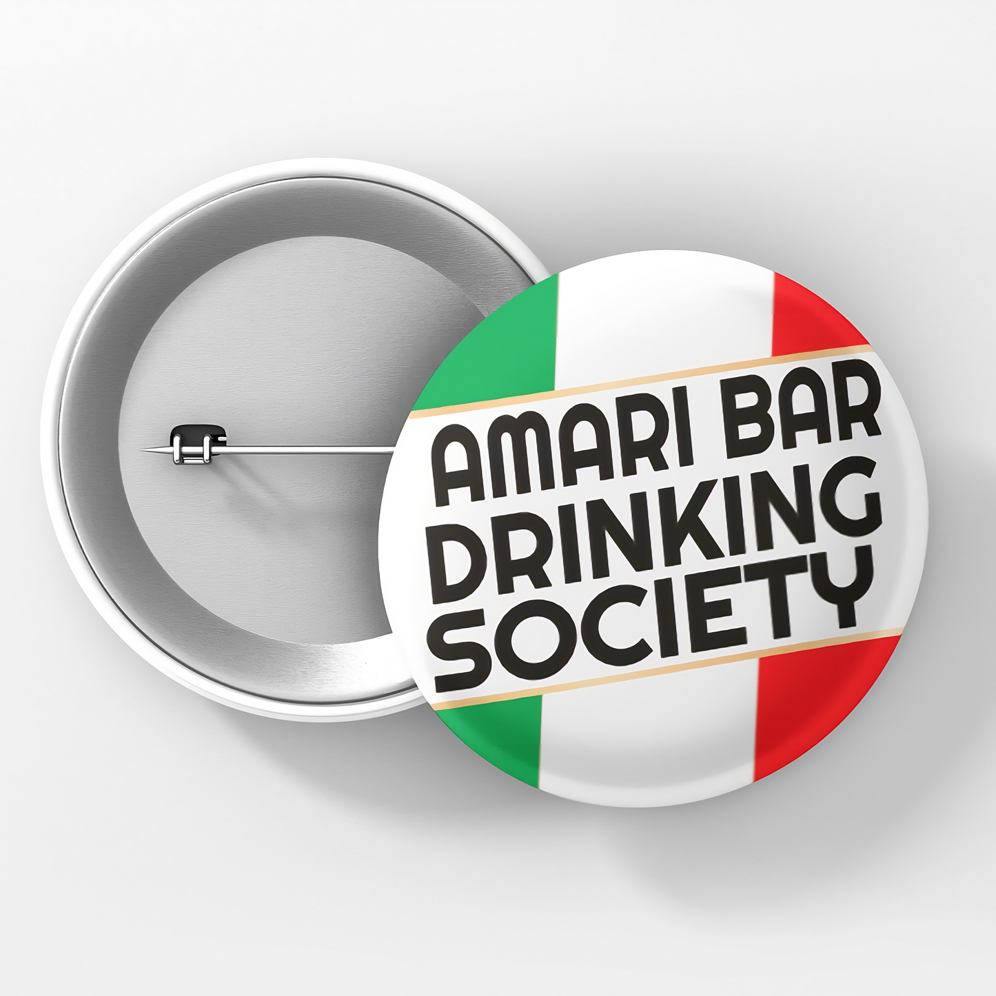 A round pin button with a white background featuring text and the Italian flag colors, designating to the Amari Bar Drinking Society.