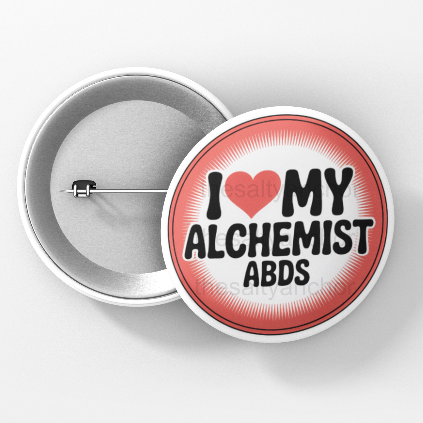 Button badge with 'I ❤️ my alchemist abds' text on a white background