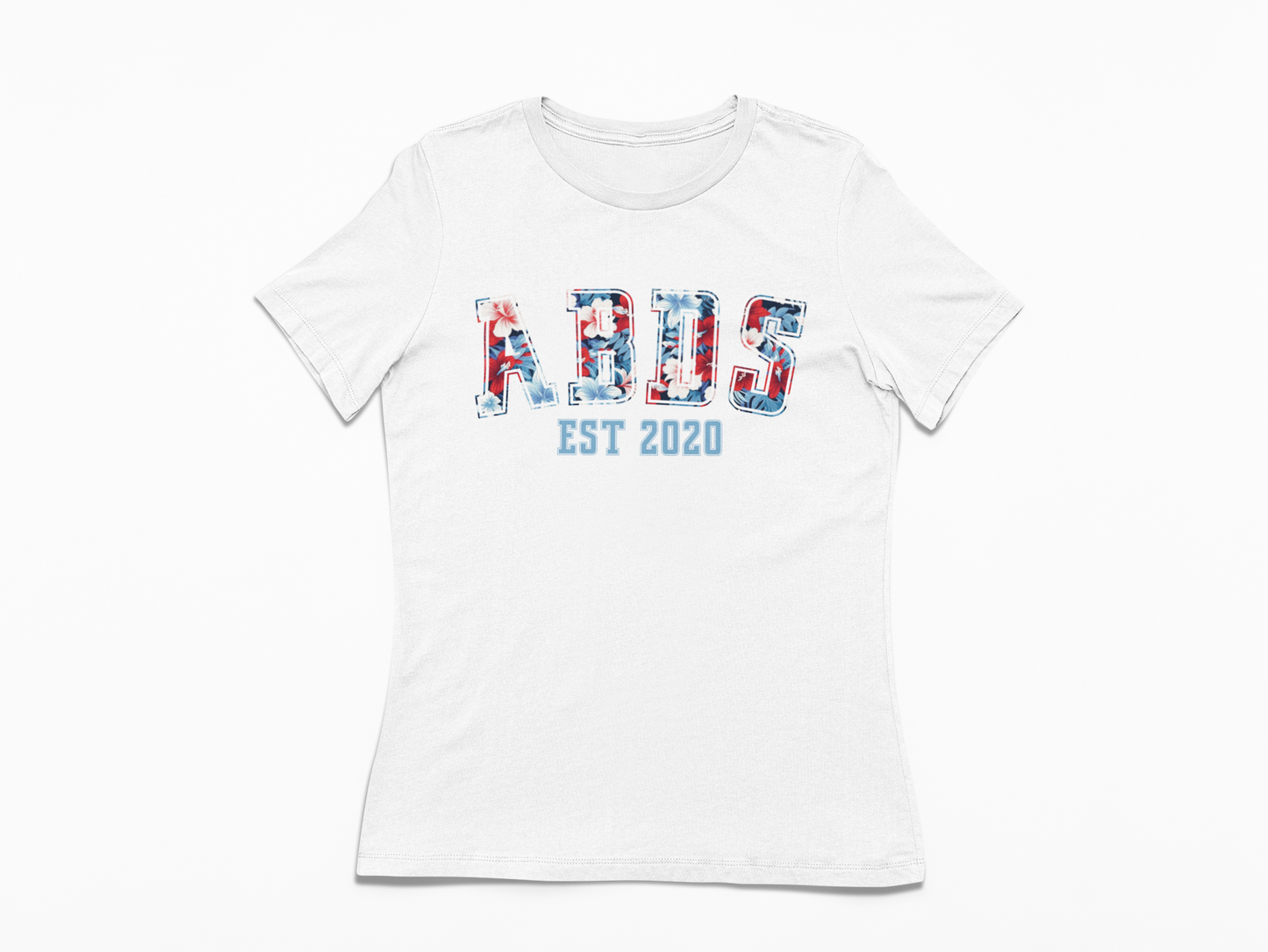 White women’s ABDS tee featuring red, white, and blue floral collegiate-style lettering with “EST 2020” printed underneath.