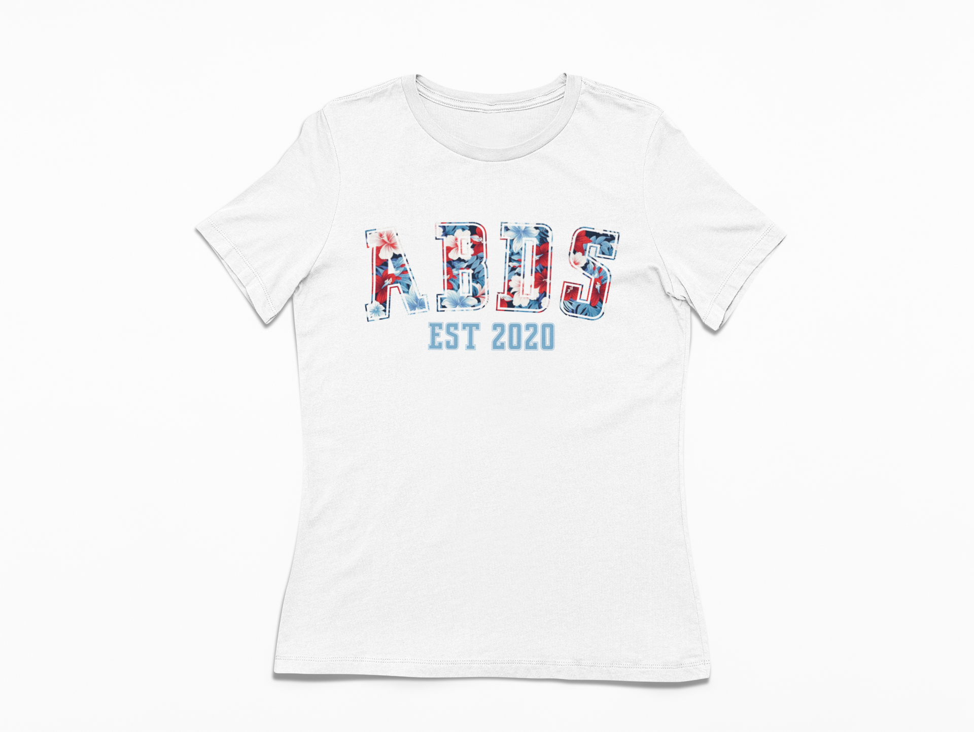 White women’s ABDS tee featuring red, white, and blue floral collegiate-style lettering with “EST 2020” printed underneath.