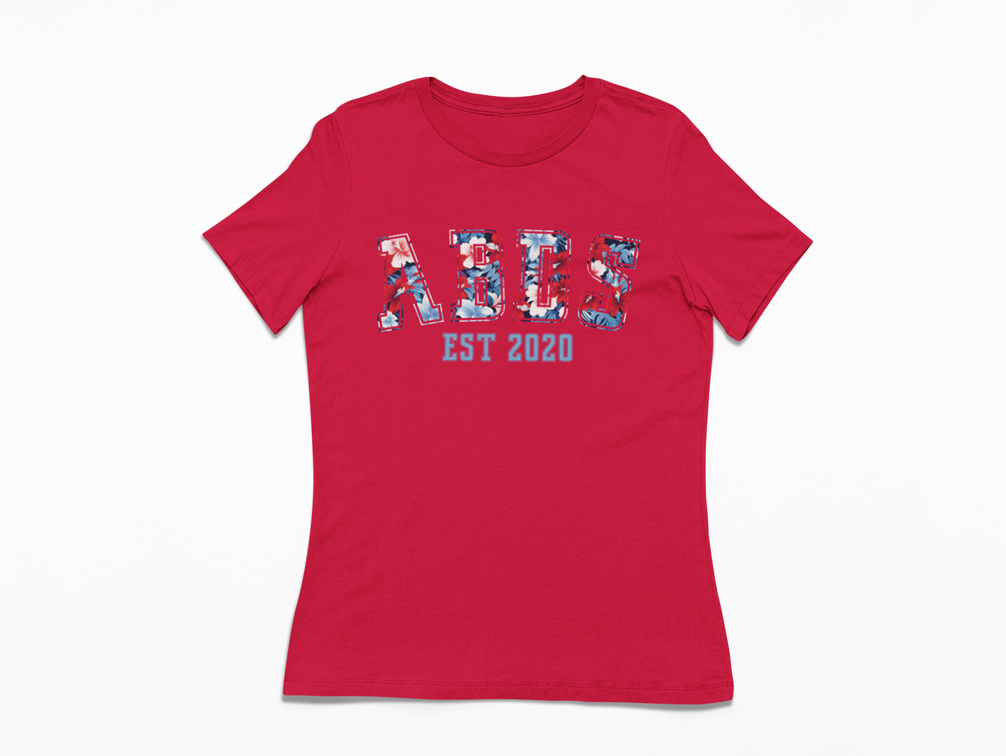 Red women’s ABDS tee featuring red, white, and blue floral collegiate-style lettering with “EST 2020” printed underneath.